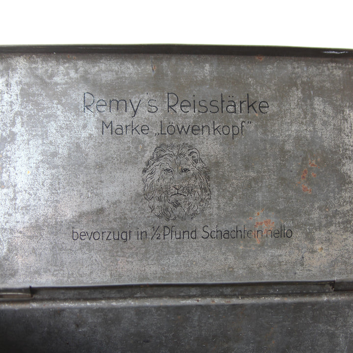 Blechdose „Remy's Reissstärke Marke Löwenkopf“ – 1920er–1930er Jahre