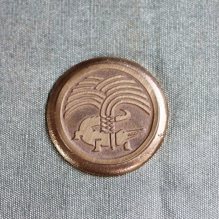 Briefbeschwerer „Nîmes“ – Philippe Starck – Bronze