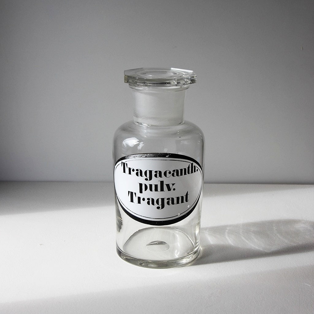 Alte Apothekerflasche für Tragant aus Klarglas mit Schliffstopfen um 1900