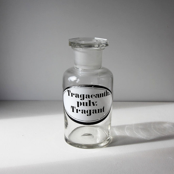 Alte Apothekerflasche für Tragant aus Klarglas mit Schliffstopfen um 1900