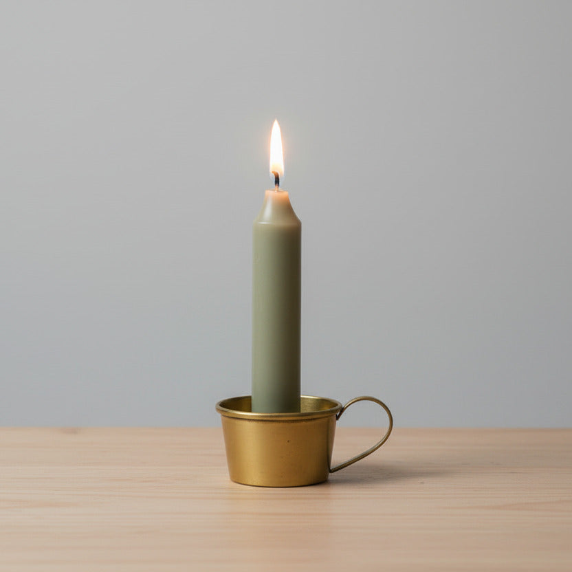 Handcrafted brass cup used as candle holder or desk storage