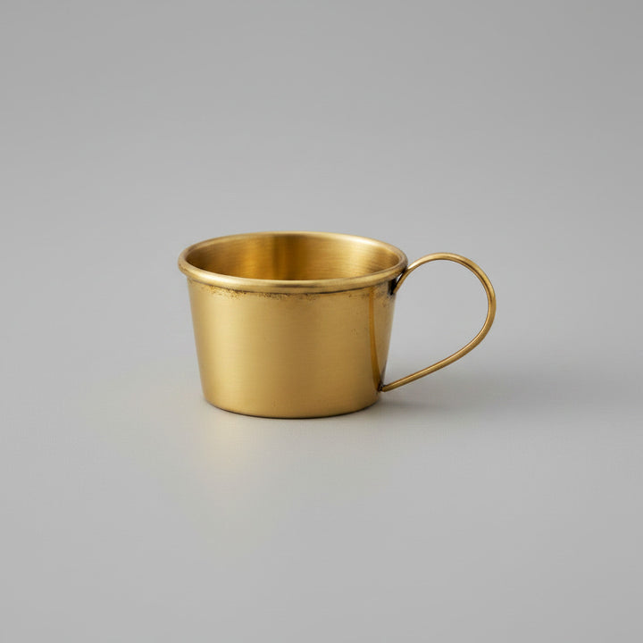 Small brass candle cup