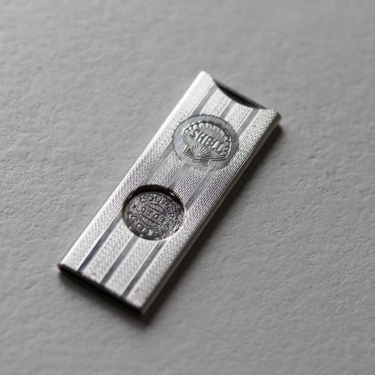 Vintage GOFA Zigarilloschneider mit Shell-Logo und patentiertem Schiebemechanismus aus den 1950er Jahren.