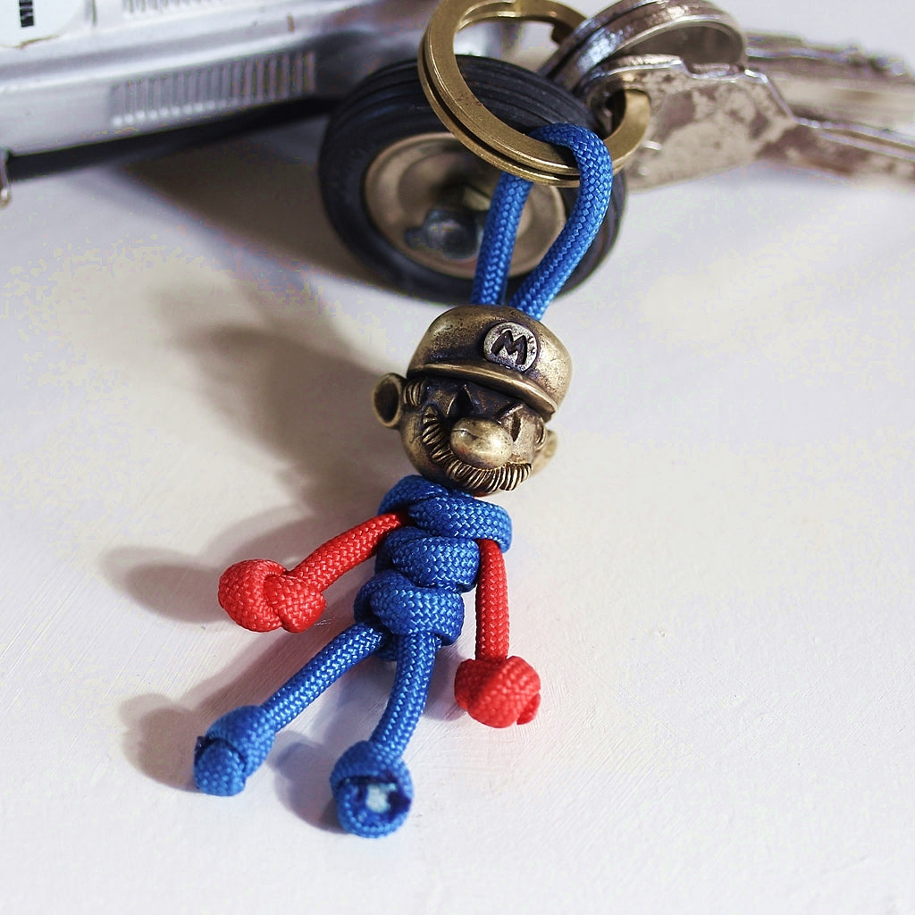 Paracord Buddy Schlüsselanhänger in Rot und Blau mit Metallring