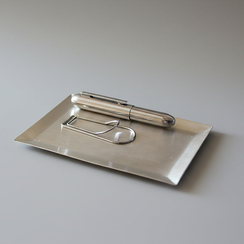 Minimal rectangle silver tray on desk