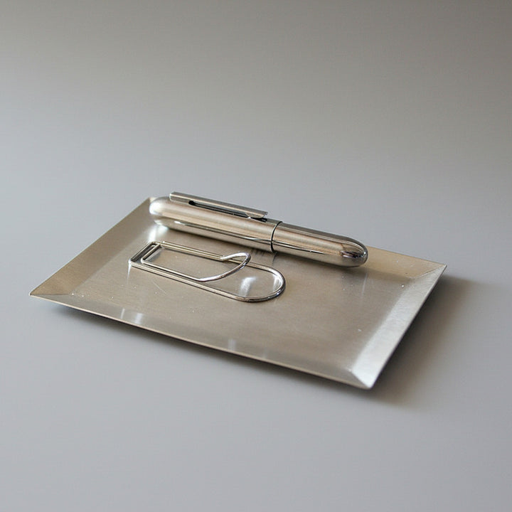 Minimal rectangle silver tray on desk