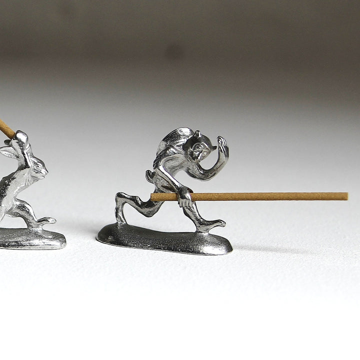 Chōjū-giga monkey pewter incense holder with incense stick by Sumitani Saburo Shoten