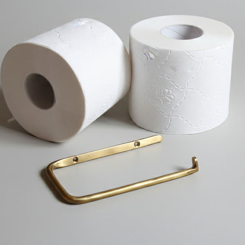 Toilet paper holder in brass